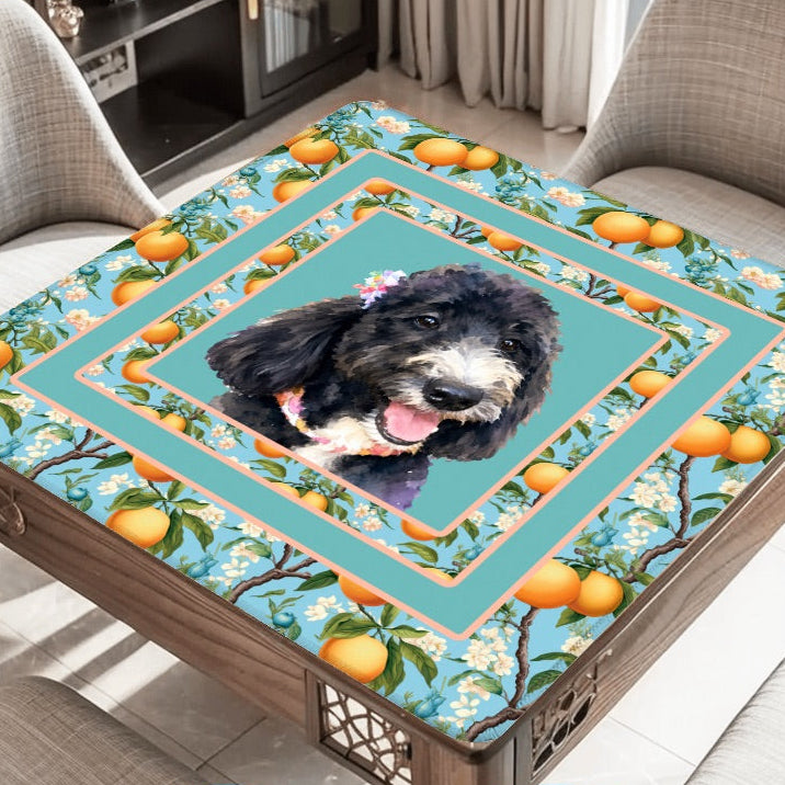 Tabletop game board with a dog illustration and playing cards on a table.