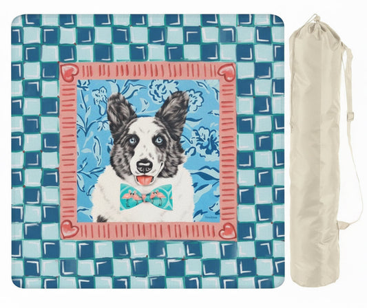 Dog-themed picnic blanket with a black carrying bag on a white background
