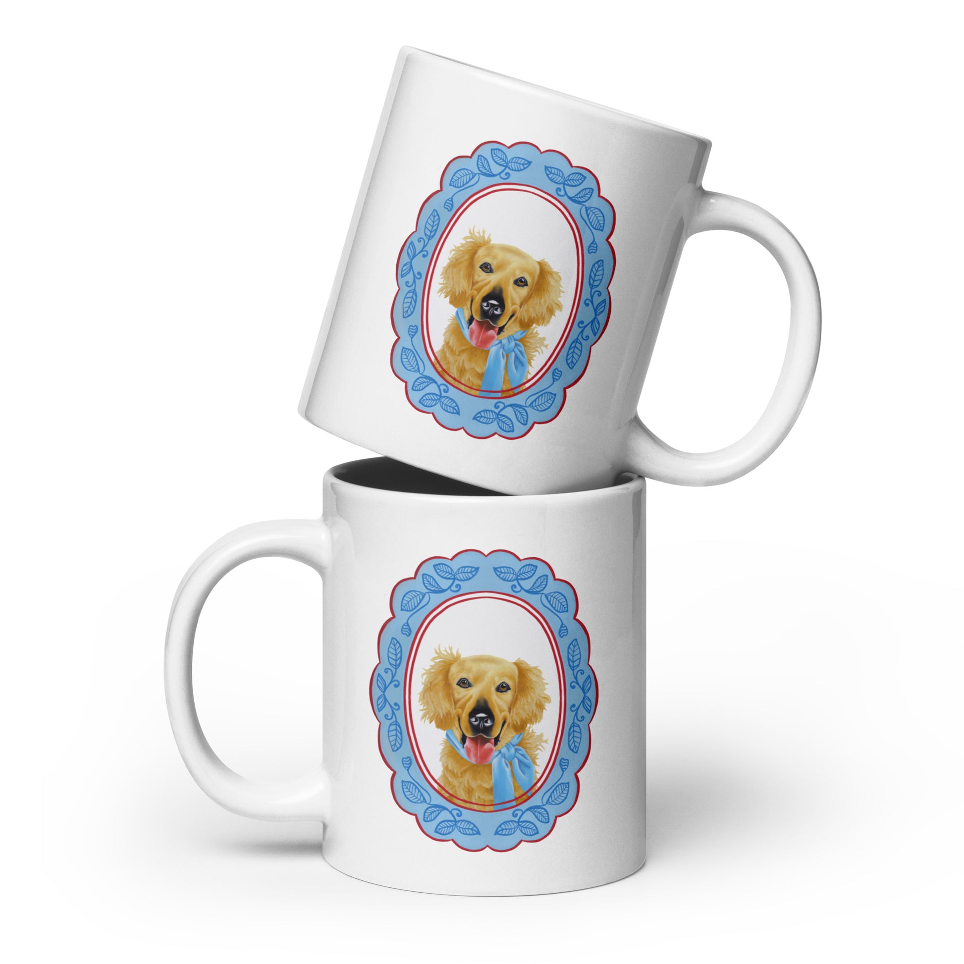 Two white mugs with a dog illustration in a blue frame on a white background